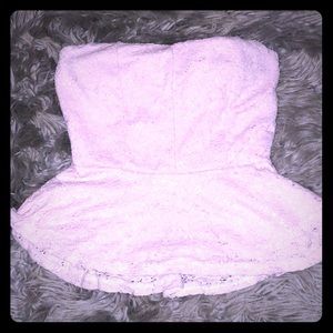 A light pink lace halter top